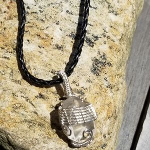 Clear stone and silver wire wrapped pendant